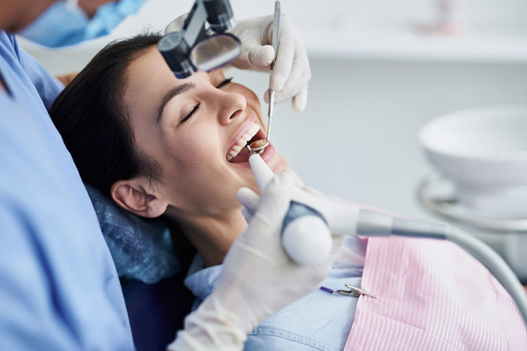 A woman on a dental exam