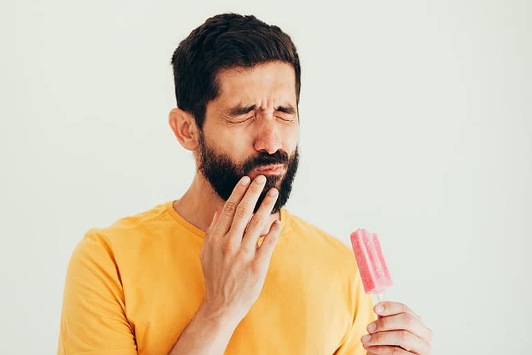 Tooth Sensitive to Hot and Cold? Here’s What It Means and How to Treat It